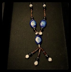 Blue beaded necklace with tassels